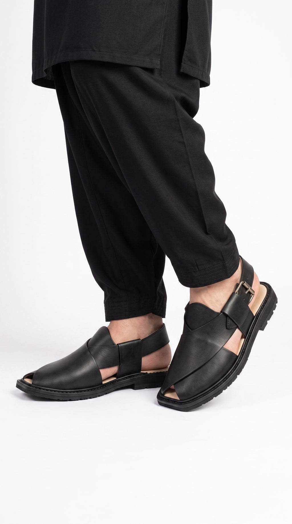 Men's Peshawri Sandal in matt black leather - worn