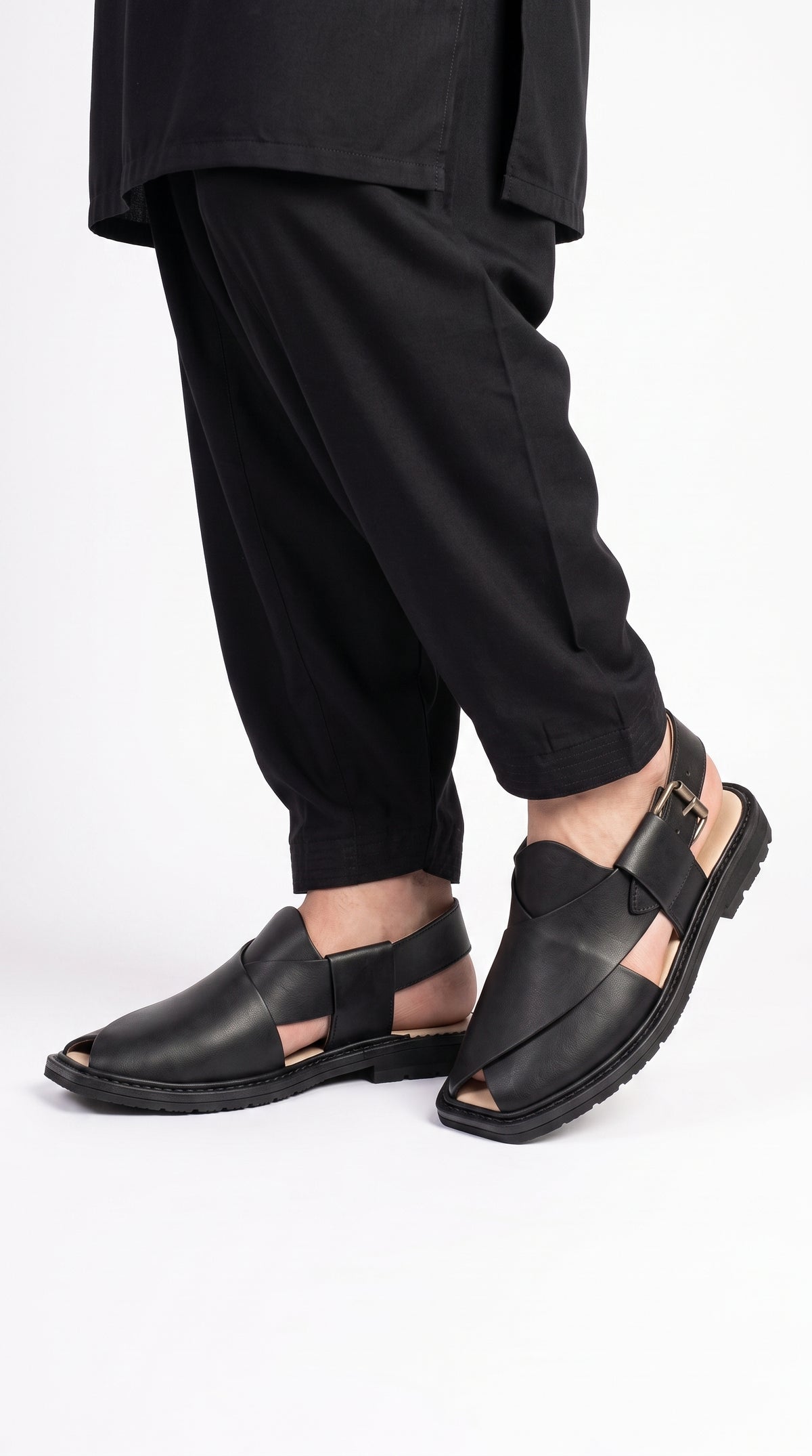 Men's Peshawri Sandal in matt black leather - worn