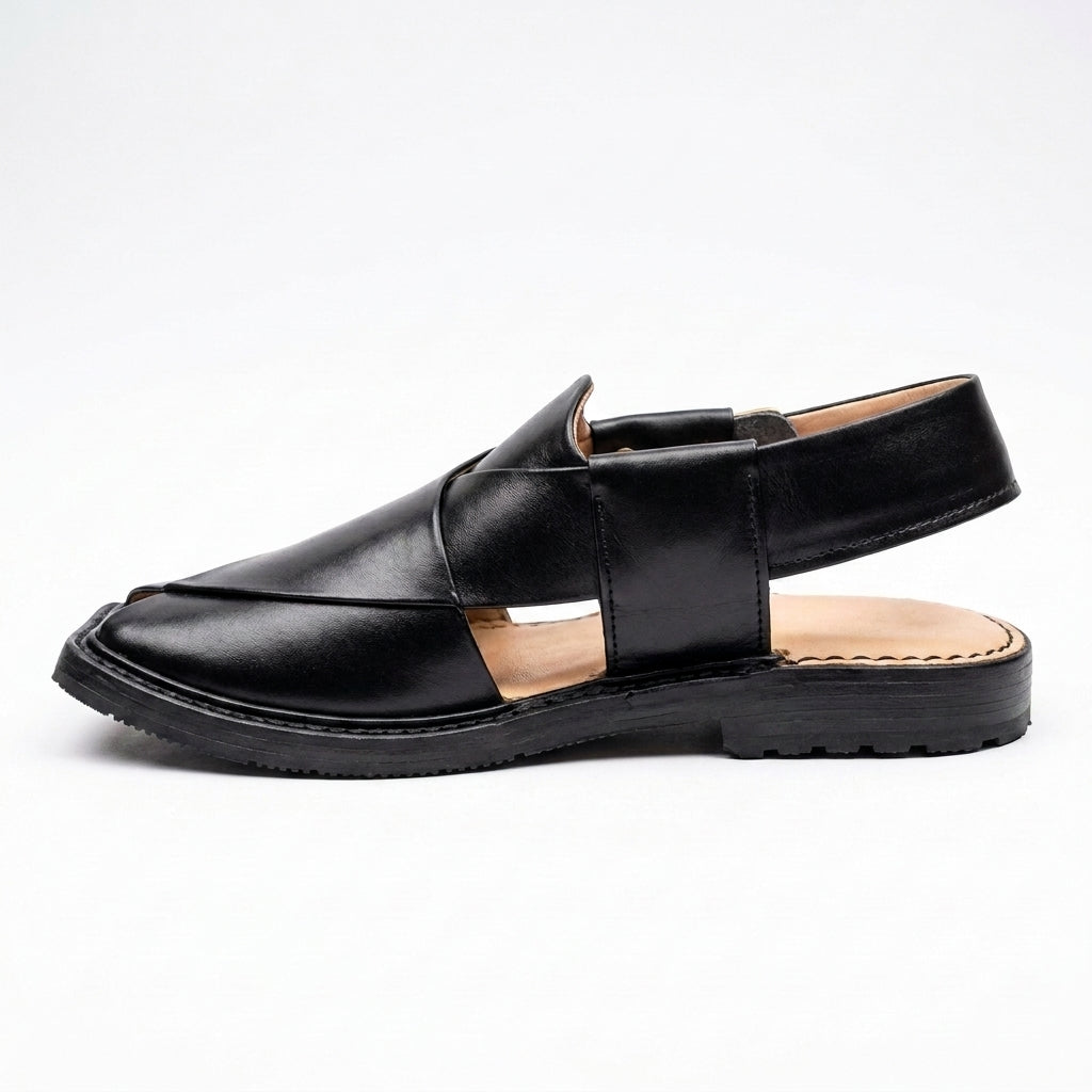 Men's Peshawri Sandal in shiny black leather - angle view