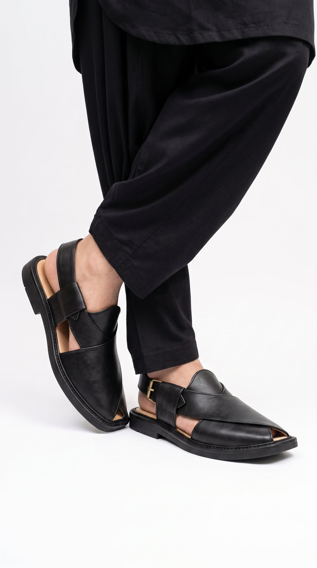 Men's Peshawri Sandal in shiny black leather - worn